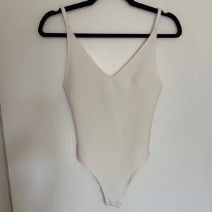 Elegant White Openback Bodysuit